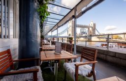 outdoor event space, eating area, outdoor chairs with faux fur on top of chairs