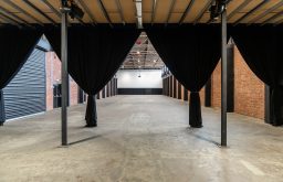 black curtains, photoshoot, event venue