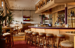 bar, bar stools and seating area near the bar