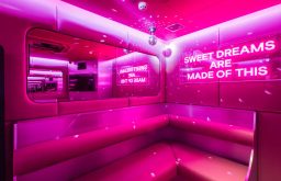 unique meeting room, pink lighting, small disco