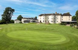 exterior of Tewkesbury Park Resort, surrounded by acres of land