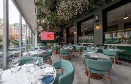 dining, restaurant, view of the outdoors, plants on the ceiling