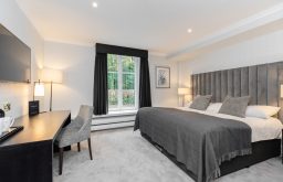 bedroom suite, grey and black furniture