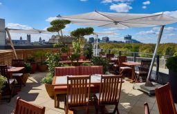 rooftop terrace, outdoor dining area, summer